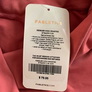 Fabletic coral colored back cross leggings